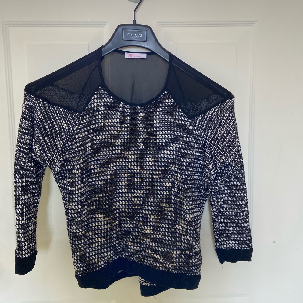 white and black sweater